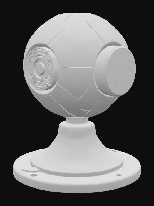 3D model for A sleek turret is comprised of a flat, disc-shaped base in dark navy, from which a compact, rotating sphere emerges. The sphere, also dark navy, is intricately etched with glowing cyan circuit patterns and possesses a small, central yellow emitter that subtly hums. The entire object has a smooth, almost seamless finish, conveying advanced, robust plastic or ceramic materials with internal luminescence.