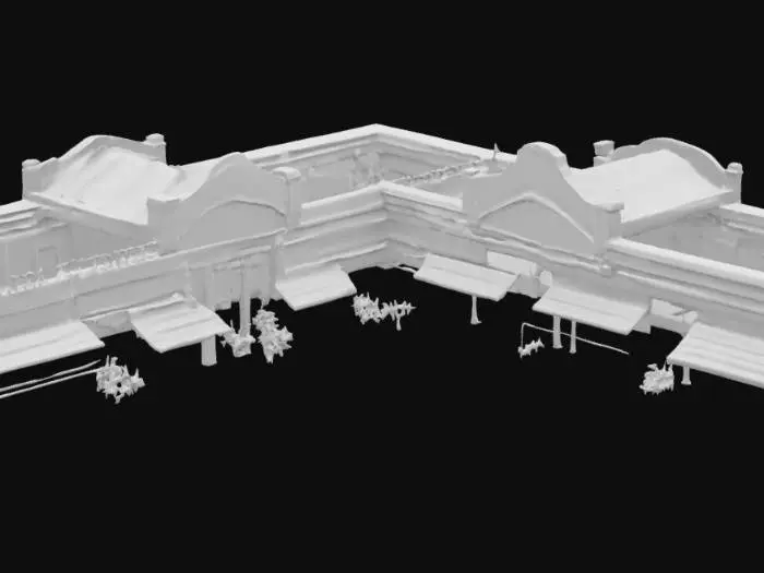 3D model for a long strip of shops that look a little worn out. 
