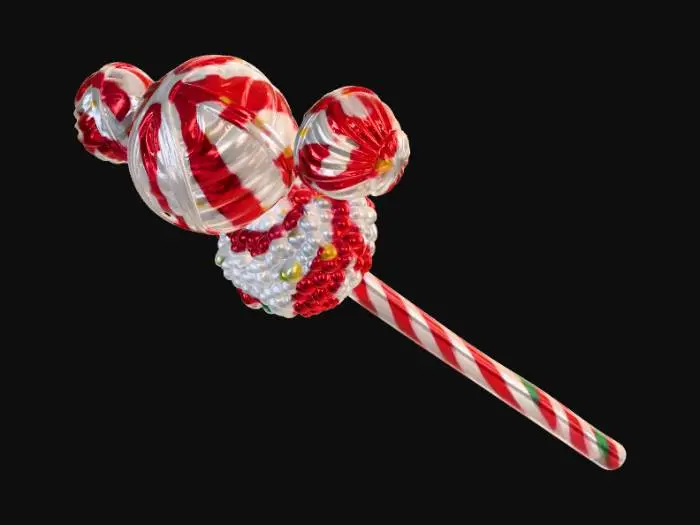 3D model for Title: Candy Mage Staff**
Description (≤800 chars):
This 3D model presents a whimsical candy mage staff, crafted entirely from colorful sweets. The shaft resembles a long striped candy cane, twisting in red, white, and pink. At the top, a large crystal-like gumdrop glows softly, surrounded by a ring of sugary shards shaped like enchanted sprinkles. Lollipop discs, jellybean clusters, and caramel swirls decorate the mid-section, giving the staff a playful yet magical feel. Subtle sparkles drift from the candy core, suggesting sweet arcane power. The design blends fantasy charm with dessert-inspired imagination.