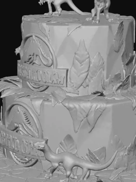 3D model for This 3D model features a stunning Jurassic World–themed birthday cake. The cake is two tiers high, coated in smooth jungle-green frosting with rocky gray textures at the base, resembling prehistoric terrain. The top tier is decorated with edible ferns, leaves, and vines, curling around the layers. At the center, a bold Jurassic World logo plaque stands proudly, crafted in metallic silver and deep blue. Small, detailed dinosaur figurines—a roaring T-Rex, a Velociraptor, and a Triceratops—are posed around the tiers, some emerging from foliage. The edges feature cracked ground effects in dark brown, as if the cake surface split from a dinosaur’s weight. PBR materials add glossy frosting shine, realistic greenery, and fine detail on the figurines, giving the cake a cinematic, celebratory.
