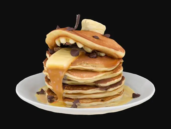 3D model for A stack of pancakes monster with his mouth open butter running it off of him his tongue out and teeth made out of chocolate chips