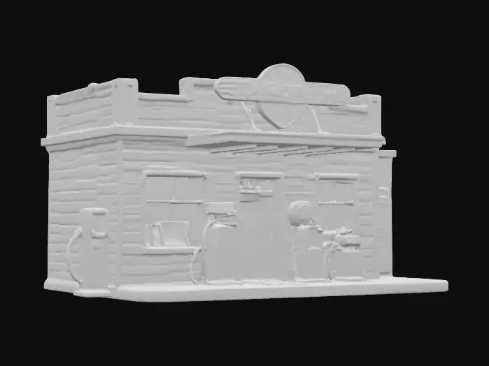 3D model for A detailed book nook featuring the miniaturized front of a retro gas station. The compact structure includes a cream-colored building facade with clear windows and a small entrance door, all made from smooth, painted wood. A wide, flat canopy extends over two tiny, silver-toned metal fuel pumps. A tall, slender pole supports a vintage-style sign with red and white branding. The ground is a dark grey, subtly textured asphalt, and the entire piece appears clean and meticulously crafted.