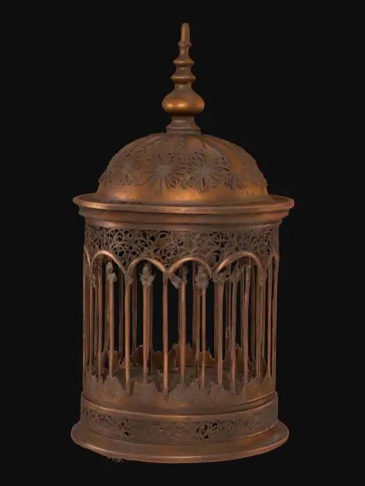3D model for old coper birdcage , The object is a cylindrical birdcage with a domed top, featuring ornate metalwork with floral and geometric patterns and a rustic bronze finish.
