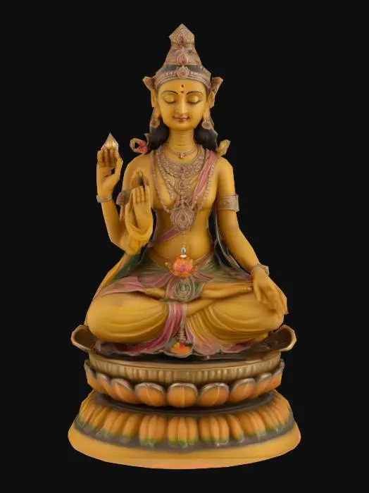 3D model for Sculpted murti of Annapurna Devi seated in a cross-legged posture on a lotus pedestal. One hand holds a shallow ladle, the other a small bowl of food. Face is serene and compassionate, adorned with a bindi and softly smiling. Wearing a flowing saree with detailed pleats and layered ornaments: bangles, earrings, and a forehead tikka. Crowned head with long hair tied in a braid. Crafted in polished brass with aged patina in carvings. Lotus base carved from red sandstone. Balanced, devotional form with watertight geometry, temple-grade detail.