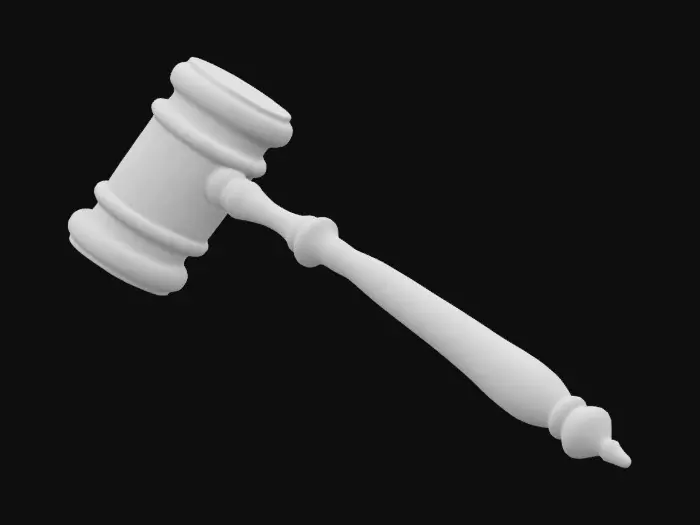 3D model for Mazo de juez, hecho de madera de nogal; con un mango alargado y cabeza redonda con detalles decorativos. 