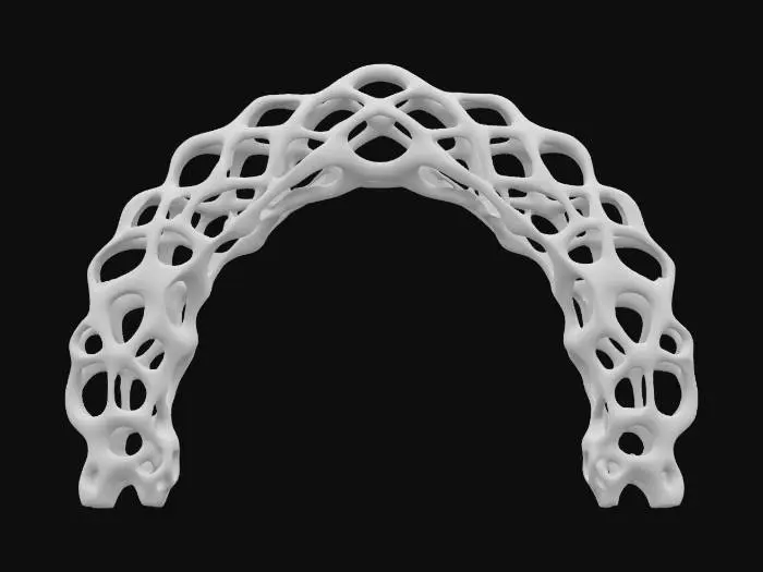 3D model for Subject: Parametric Voronoi lattice arch

Style: Futuristic organic parametric design

Material: Matte white ceramic structure with integrated LED modules

Details:

A single sweeping arch formed by interlocking Voronoi cells of varying sizes

Subtle beveled edges on each cell for a refined, high-poly look

Warm white LED backlighting embedded within select cells for depth

Smooth transitions between cells, emphasizing structural flow
, #arch#PBR Ceramic: Fine-grain matte ceramic with slight subsurface scatter

Emissive LEDs: Warm white glow with adjustable intensity and soft falloff

Surface Imperfections: Very light micro-roughness and faint dust accumulation in cell crevices