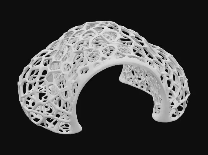 3D model for Subject: Parametric Voronoi lattice arch

Style: Futuristic organic parametric design

Material: Matte white ceramic structure with integrated LED modules

Details:

A single sweeping arch formed by interlocking Voronoi cells of varying sizes

Subtle beveled edges on each cell for a refined, high-poly look

Warm white LED backlighting embedded within select cells for depth

Smooth transitions between cells, emphasizing structural flow
, #arch#PBR Ceramic: Fine-grain matte ceramic with slight subsurface scatter

Emissive LEDs: Warm white glow with adjustable intensity and soft falloff

Surface Imperfections: Very light micro-roughness and faint dust accumulation in cell crevices