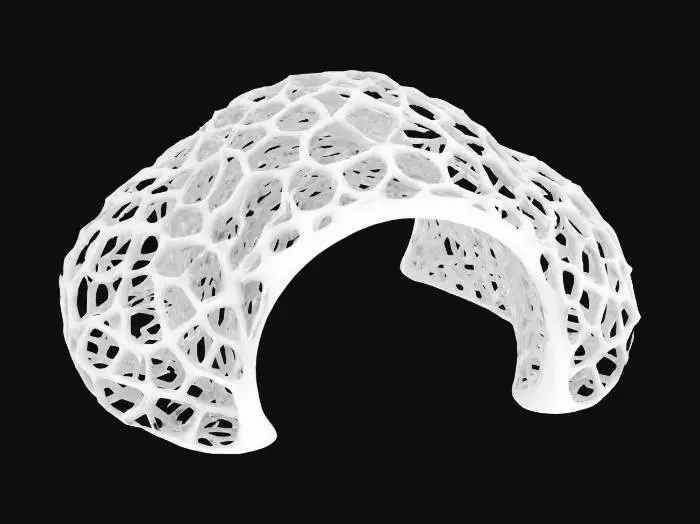 3D model for Subject: Parametric Voronoi lattice arch

Style: Futuristic organic parametric design

Material: Matte white ceramic structure with integrated LED modules

Details:

A single sweeping arch formed by interlocking Voronoi cells of varying sizes

Subtle beveled edges on each cell for a refined, high-poly look

Warm white LED backlighting embedded within select cells for depth

Smooth transitions between cells, emphasizing structural flow
, #arch#PBR Ceramic: Fine-grain matte ceramic with slight subsurface scatter

Emissive LEDs: Warm white glow with adjustable intensity and soft falloff

Surface Imperfections: Very light micro-roughness and faint dust accumulation in cell crevices