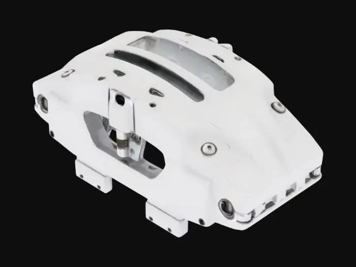 3D model for {
  "Object": "GT3-class brake caliper",
  "Material": "Near-net forged aluminium alloy (T6-equivalent) body; stainless-steel pistons; high-temperature seal compounds",
  "Shape/Form": "Monobloc radial-mount caliper with 210 × 42 mm mounting centers; front unit houses six pistons (2×Ø27.0 mm, 2×Ø31.8 mm, 2×Ø38.1 mm); integrated internal porting, optional dry-bleed valves, ducted air-cooling channels",
  "Color Scheme": "Bare machined aluminium silver (optionally anodized accents)",
  "Texture Details": "CNC-machined mounting faces and piston bores Ra ≤ 0.02 mm; visible tool-path marks on fluid channels; subtle forged grain on exterior surfaces",
  "Style": "Realistic PBR",
  "Reference Models": [
    "<URL or local path to STEP/IGES from CMM or laser-scan data>"
  ],
}
