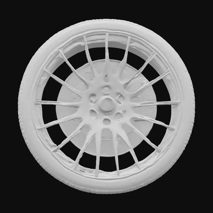 3D model for {
  "object": "car wheel",
  "rim_pattern": "interlaced spokes",
  "rim_spoke_count": 20,
  "rim_style": "aerodynamic",
  "hub_detail": "visible racing brake calipers",
  "rim_texture": "polished chrome",
  "tire_texture": "matte black performance",
  "features": ["optimized airflow", "precision-machined", "symmetrical spokes", "ventilated brakes"]
}
