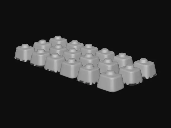 3D model for 12 individual luxury squares of chocolate in a row, each with a different topping such as an egg, chocolate drizzled, sprinkles, or a nut