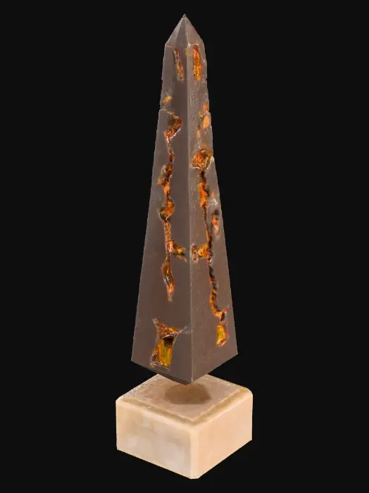 3D model for A floating obelisk-shaped artifact, made of cracked obsidian with embedded glowing runes. Deep grooves filled with pulsing amber light spiral up the core. The object appears levitating slightly above a carved stone base, surrounded by faint glowing debris fragments.