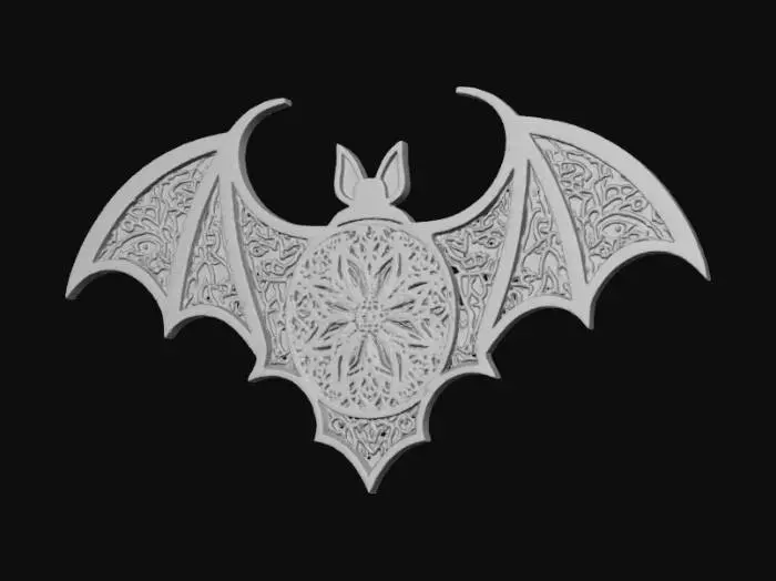 3D model for A multi-layered 3D laser-cut bat wall art, featuring a dark slate grey outer silhouette. Beneath this top layer, intricate, mandala-inspired patterns are carved into lighter, creamy off-white layers, revealing complex floral and tribal motifs. The entire piece has a smooth, matte wood-like texture, creating distinct depth and shadow play between its stacked components. It is mounted flat against a light beige wall, with natural light casting soft, elongated shadows from the object and a subtle window pattern across the scene., #Halloween2025#