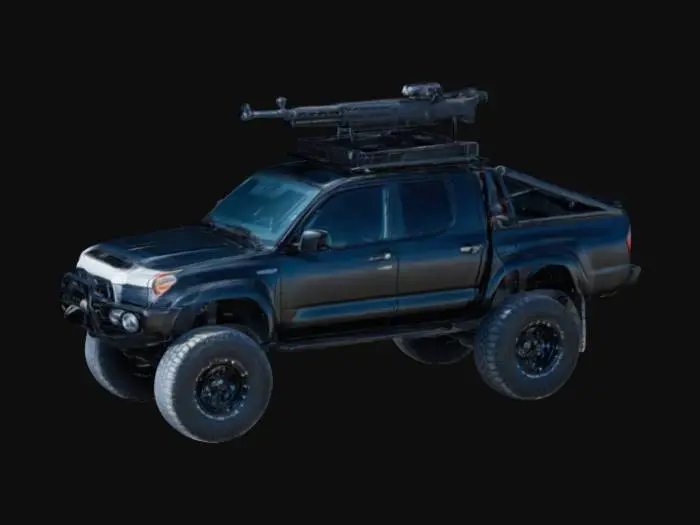 3D model for  модифицированный черный пикап Toyota, припаркованный на асфальте перед зданием с белыми стенами и закрытыми роллетами. У автомобиля массивные внедорожные шины, усиленный бампер, затемненные окна и установленное на крыше вооружение, похожее на пулемет