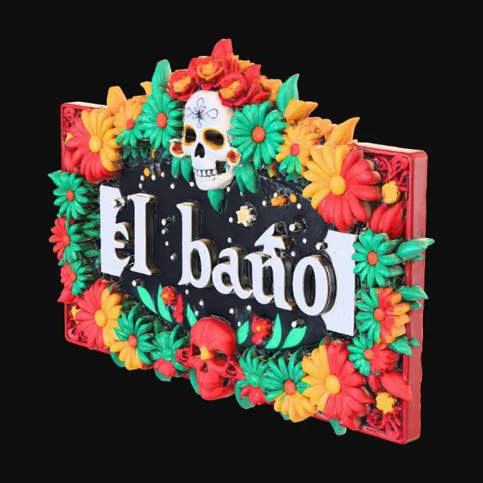 3D model for a sign the the words el baño with day of the dead designs embellishing 6 inches wide 5 inches tall with centered text 3.5 inches tall