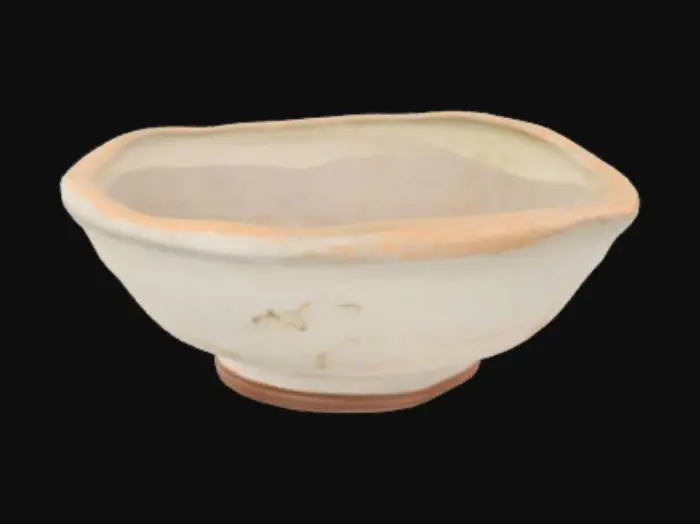 3D model for A medieval fantasy ceramic bowl and wash basin set, crudely made from low-fired clay with a pale, uneven glaze that flakes in spots. The bowl is small and shallow, with a slightly lopsided rim and faint finger marks from the potter’s hands still visible along the sides. The basin is wider, chipped along one edge, with a dull, matte surface stained from repeated use. Both pieces rest on a simple wooden stand or shelf, their surfaces cracked with fine lines from age and poor firing. Water leaves a faint mineral ring after sitting too long. Common in low-cost inn rooms, the set is functional but clearly handmade, rough, and meant more for necessity than comfort.















