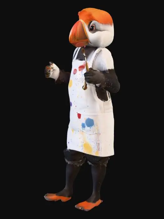3D model for a whimsical female puffin wearing a paint splattered apron with a paint brush in the pocket of the apron and a paint brush in her right hand