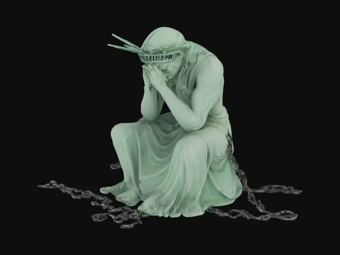 3D model for the Statue of Liberty sits slumped at the base of her pedestal, her head bowed and hands covering her face in despair. Broken chains lie scattered at her feet. 