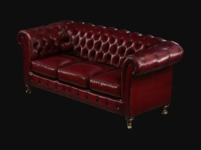 3D model for A Deep red three seat leather Victorian chesterfield sofa with dark wood legs and ivory castor feet