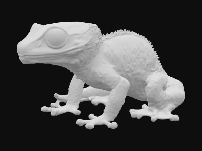 3D model for A miniature, crouching gecko, its entire body covered in a mesmerizing, scaly texture that glows with a shifting, oil-slick iridescence, blending deep teal, royal blue, and fiery red-orange hues. Each individual scale appears as a tiny, highly polished metallic plate, creating a bumpy yet slick surface. Its slender limbs and prehensile tail possess the same metallic, almost enameled quality, feeling cool and firm to the touch, like a living, articulated piece of high-tech jewelry.