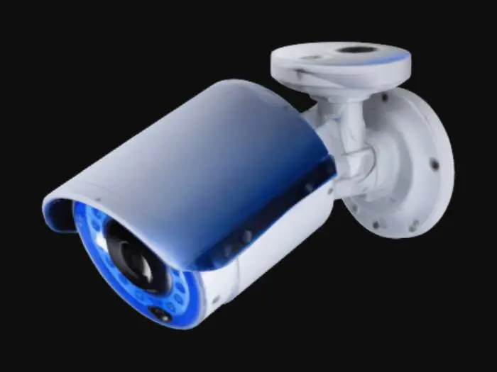 3D model for A compact 10cm width, 10cm height, 15cm length CCTV camera with a sleek, weatherproof dome design. The body is a mix of blue and white, with a tinted transparent cover protecting a wide-angle lens. infrared night vision sensors surrounding it. The camera is mounted on a sturdy, adjustable bracket for wall installation. Small LED indicator light are present, showing it operational status. The design should be compact, professional, suitable for both indoor and outdoor surveillance.