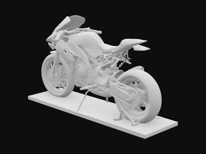 3D model for A 3D sculpture of a modern racing motorcycle placed on a flat display stand. The motorcycle features aerodynamic fairings, low handlebars, slick tires, and a visible chain and exhaust system. It is sculpted in a static, upright position with a functional rear wheel stand integrated into the base. The entire model is a single solid mesh, with no floating parts, designed for 3D printing.