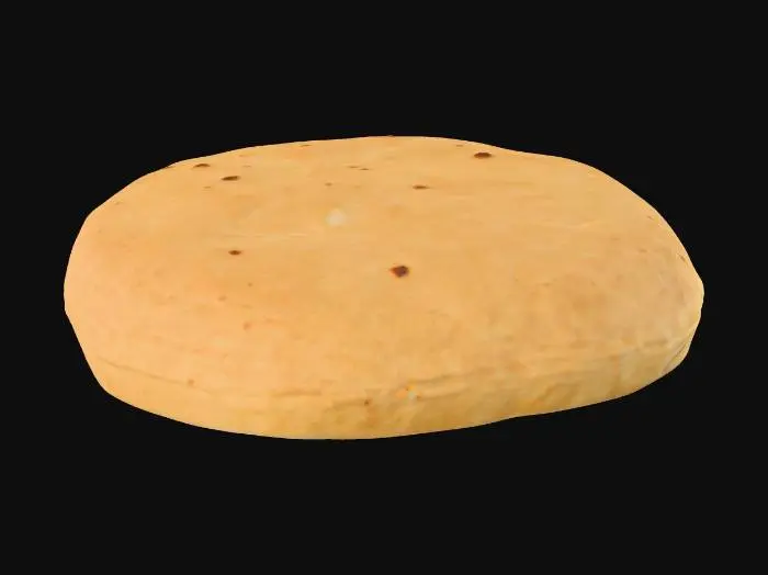 3D model for A thin, circular piece of unleavened bread, subtly uneven with a slightly rippled surface. Its color is a warm, toasted beige, featuring small, darker brown spots from baking, indicating a crisp yet pliable texture. The material appears dense and finely grained, with a matte finish. It feels firm to the touch, possibly with a subtle dryness.