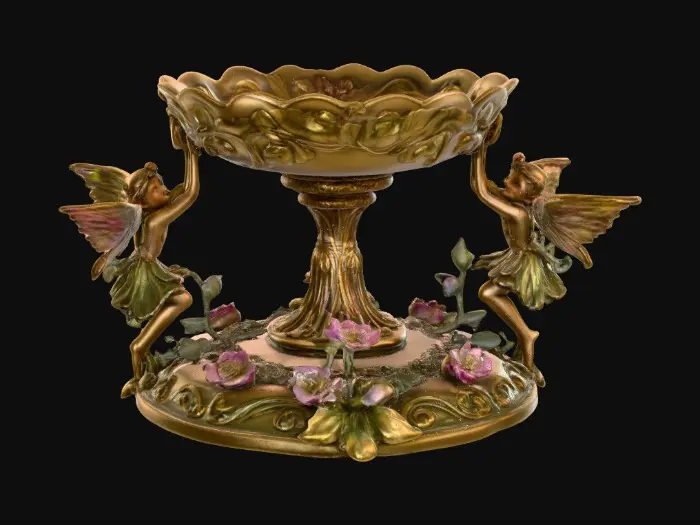 3D model for A pedestal comprised of small fairies that are holding a bowl shapped base above their heads. The complete design is on a 3 inch round base. Victorian, Extravagant, elaborately embossed design. A masterpiece of art nouveau, lush botanicals are interwoven into the design
