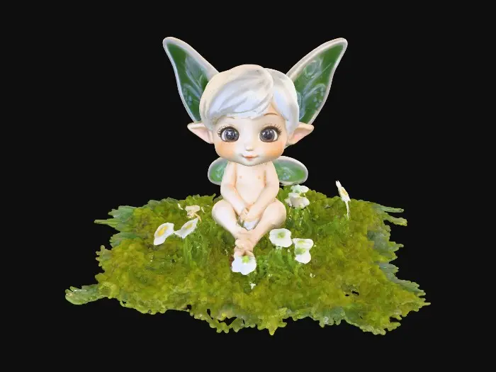 3D model for Ceramic figurine of a Chibi child like snowdrop fairy. Perfect facial features with well formed arms, hands, legs, & feet. Well defined wings. Fairy is sitting on a round patch of grass.