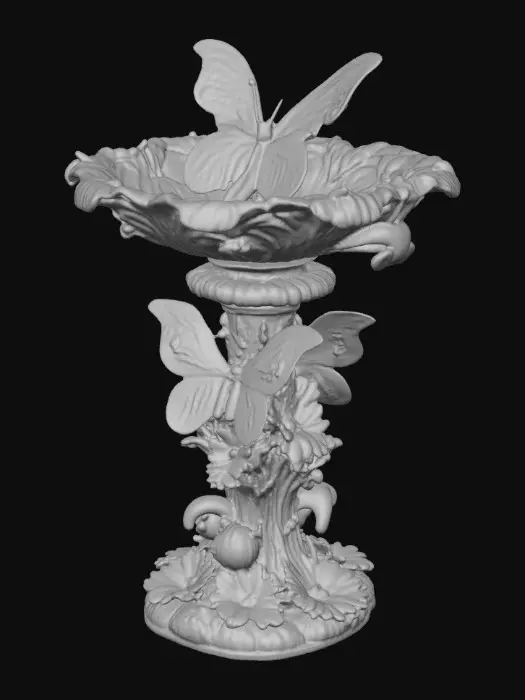 3D model for A pedestal comprised of three butterflies that are holding a bowl shapped base above their wings. The complete design is on a 3 inch round base. Victorian, Extravagant, elaborately embossed design. A masterpiece of art nouveau, lush botanicals are interwoven into the design