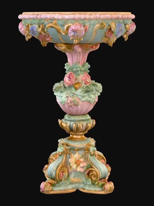3D model for An elaborately designed pestal with a small bowl shapped base on top. The pedestal sits on a 3 inch base plate. The entire design is a masterpiece of art comprised of lush botanical, florals. Elements of Rocco, art nuevo era. Colors representing the victorian era.