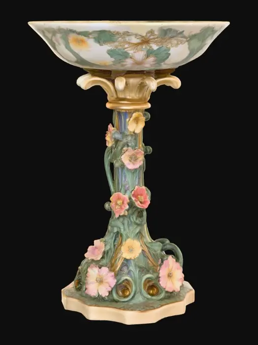 3D model for An elaborately designed pestal with a small bowl shapped base on top. The pedestal sits on a 3 inch base plate. The entire design is a masterpiece of art comprised of lush botanical, florals. Elements of Rocco, art nuevo era. Colors representing the victorian era.