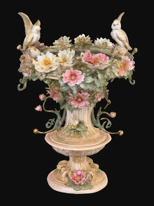 3D model for An elaborately designed pestal with a small bowl shapped base on top. The pedestal sits on a 3 inch base plate. The entire design is a masterpiece of art comprised of lush botanical, florals, cherubs and birds. Elements of Rocco, art nuevo era. Colors representing the victorian era.