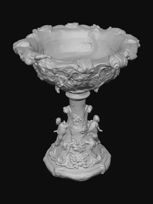3D model for An elaborately designed pestal with a small bowl shapped base on top. The pedestal sits on a 3 inch base plate. The entire design is a masterpiece of art comprised of lush botanical, florals, cherubs and birds. Elements of Rocco, art nuevo era. Colors representing the victorian era.