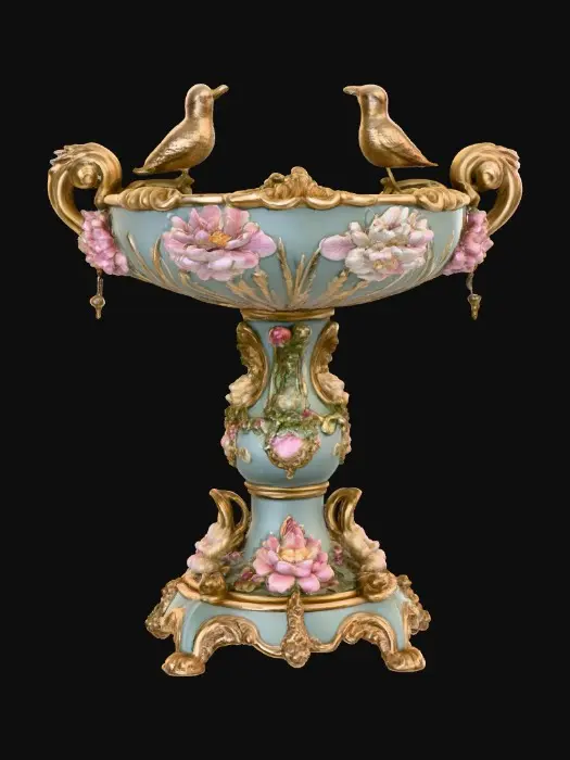 3D model for An elaborately designed pestal with a small bowl shapped base on top. The pedestal sits on a 3 inch base plate. The entire design is a masterpiece of art comprised of lush botanical, florals, cherubs and birds. Elements of Rocco, art nuevo era. Colors representing the victorian era.