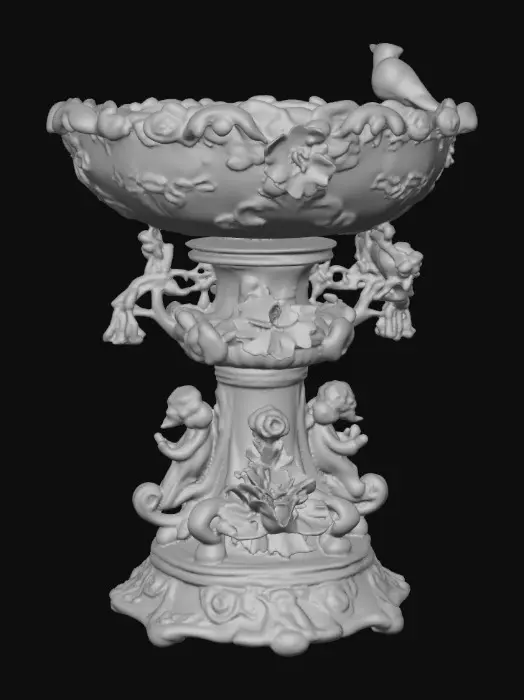 3D model for An elaborately designed pestal with a small bowl shapped base on top. The pedestal sits on a 3 inch base plate. The entire design is a masterpiece of art comprised of lush botanical, florals, cherubs and birds. Elements of Rocco, art nuevo era. Colors representing the victorian era.