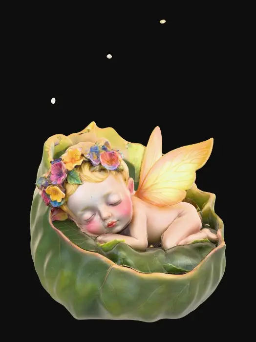 3D model for A beautiful delicate and highly detailed fairy baby with porcelain wings sleeps peacefully upon a fallen leaf that forms a soft cradle for the baby. The fairy wears a crown of colorful flowers.