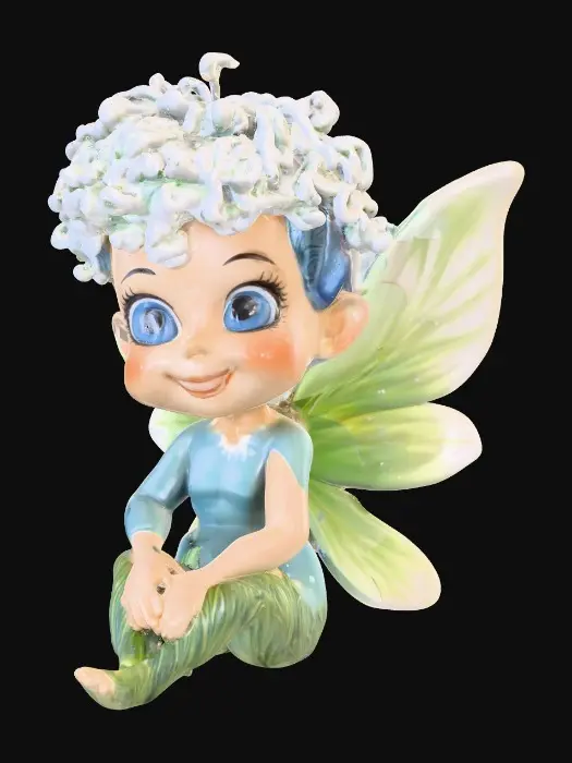 3D model for Ceramic figurine of a Chibi child like snowdrop fairy. Perfect facial features with well formed arms, hands, legs, & feet. Well defined wings. Fairy is sitting on a round patch of grass. Beautiful full wide smile. Twinkling large blue eyes. Wild Curly hair