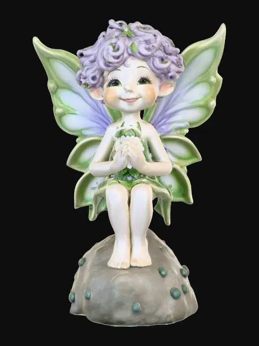 3D model for Ceramic figurine of a snowdrop fairy. Perfect facial features with well formed arms, hands, legs, & feet. Well defined wings. Fairy is sitting on a round rocky base. Beautiful full wide smile laughing uncontrollably. Twinkling large colored eyes. Wild thick Curly hair. Shades of green, white, and lavender