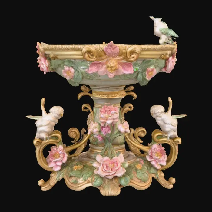 3D model for An elaborately designed pestal with a small bowl shapped base on top. The pedestal sits on a 3 inch base plate. The entire design is a masterpiece of art comprised of lush botanical, florals, cherubs and birds. Elements of Rocco, art nuevo era. Colors representing the victorian era.