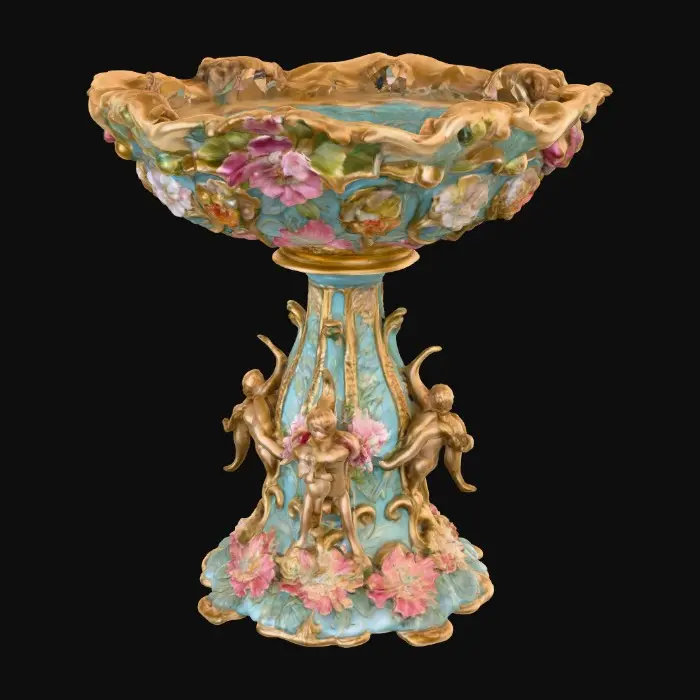 3D model for An elaborately designed pestal with a small bowl shapped base on top. The pedestal sits on a 3 inch base plate. The entire design is a masterpiece of art comprised of lush botanical, florals, cherubs and birds. Elements of Rocco, art nuevo era. Colors representing the victorian era.