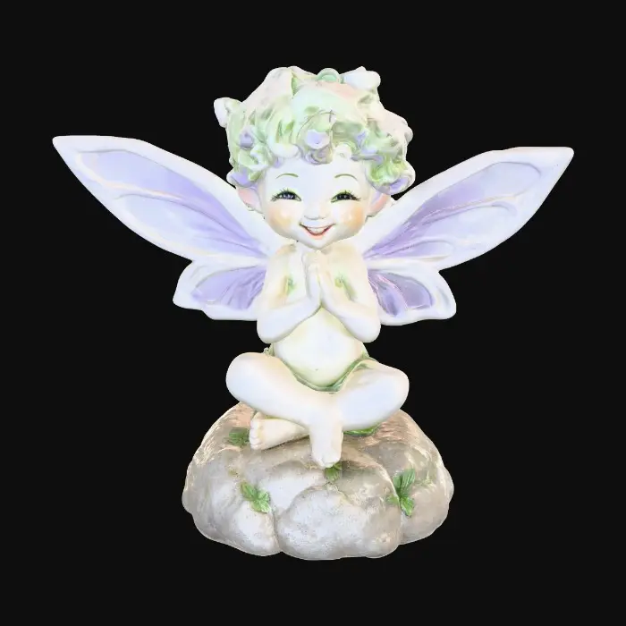 3D model for Ceramic figurine of a snowdrop fairy. Perfect facial features with well formed arms, hands, legs, & feet. Well defined wings. Fairy is sitting on a round rocky base. Beautiful full wide smile laughing uncontrollably. Twinkling large colored eyes. Wild thick Curly hair. Shades of green, white, and lavender