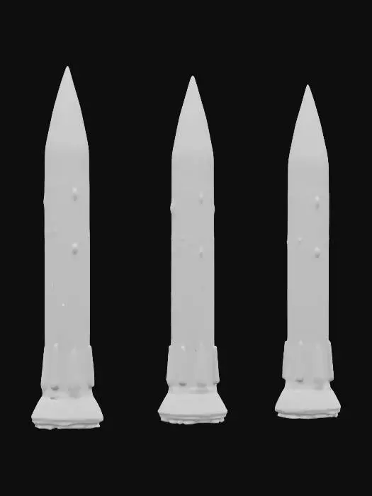 3D model for Three life-size missiles white with gold marble. set to launch any second now.