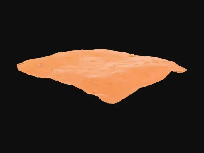 3D model for Un suelo de desierto árido y expansivo, compuesto principalmente por arena fina y suelta de tonos ocre, naranja claro y beige tostado. La superficie presenta ondulaciones suaves formadas por dunas bajas y acumulaciones de arena arrastradas por el viento, con algunas pequeñas rocas angulares y guijarros dispersos de color rojizo. La textura es polvorienta y granular al tacto, con un aspecto seco y resquebrajado en algunas áreas debido a la falta de humedad.