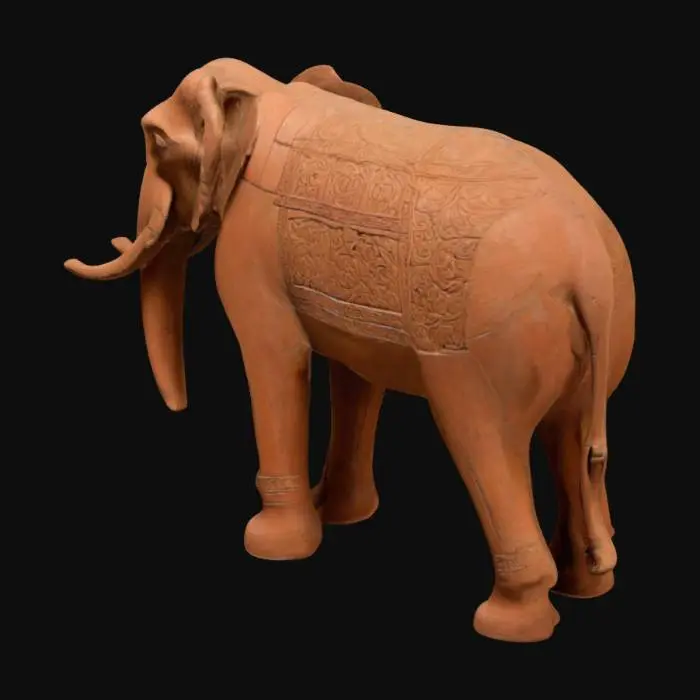 3D model for "Create an extremely thin and elongated terracotta elephant sculpture with long, slender legs and a gracefully stretched body. Its head, trunk, and ears should feature intricate carvings with floral and geometric patterns. Rows of small, suspended bells should drape elegantly across its form. The trunk should be long, tapering, and finely engraved. The texture should resemble handcrafted terracotta with an earthy tone, subtle imperfections, and a majestic yet surreal aesthetic