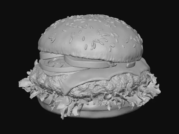 3D model for Realistic 3D model of a gourmet burger: a golden-brown sesame seed bun (top and bottom) slightly shiny, crisp lettuce leaves, a juicy beef patty with grill marks, melted cheddar cheese over the patty dripping slightly, a slice of tomato peeking out, a few rings of red onion, some sesame seeds on top bun, soft shadows, natural lighting. Photorealistic, high resolution, full colors, slightly stylized but realistic food render, ready for 3D export.