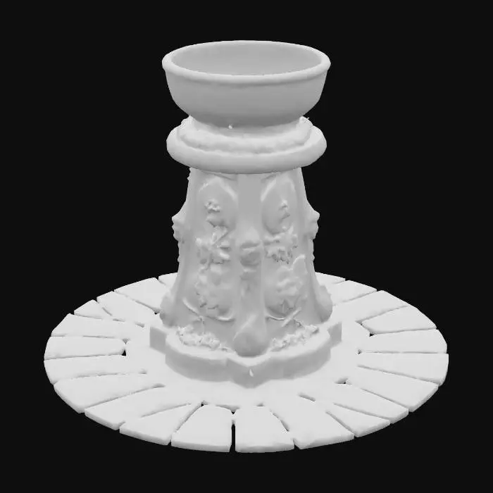 3D model for The object is a decorative pedestal featuring a wide, ornate bronze bowl atop a textured stone base with intricate floral carvings and mossy accents., 