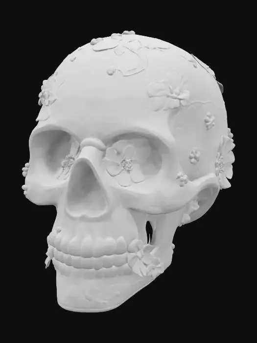 3D model for The object is a black skull with intricate, colorful floral and vine patterns, featuring a predominantly smooth texture interspersed with detailed, raised embellishments., 