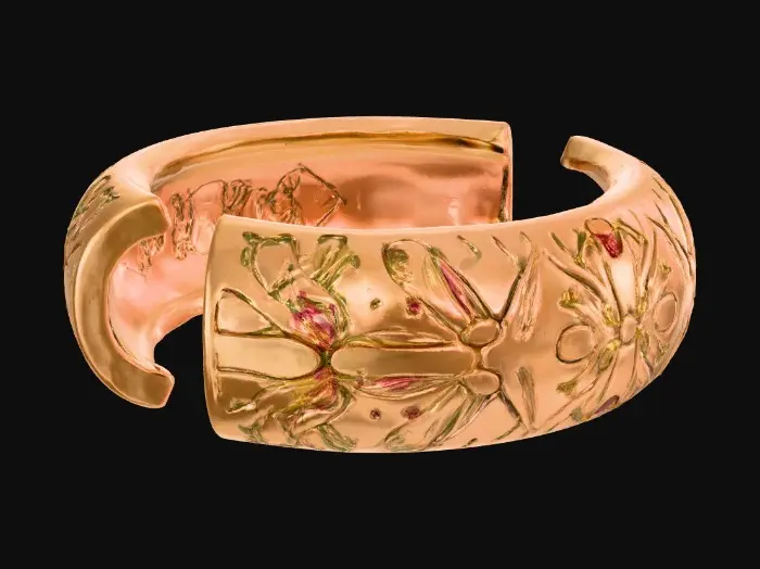 3D model for A crisp, high-fidelity 8K render of an oval bracelet split into two halves, floating in air against a blank neutral background. Each half features interlocking finger joints—three perfectly aligned rectangular teeth with sharp edges and precise symmetry. The surface is finished with deep, debossed floral engravings of Nancy-cherry and mango blooms, rendered in true botanical accuracy: recognizable petals, layered curvature, visible stamens, and delicate leaf veins recessed cleanly into the surface. The design is minimal, elegant, and flawlessly finished; the deboss depth creates sharp shadow lines and crisp texture, while soft, even lighting accentuates the floral detail and the refined geometry of the interlocking joints.