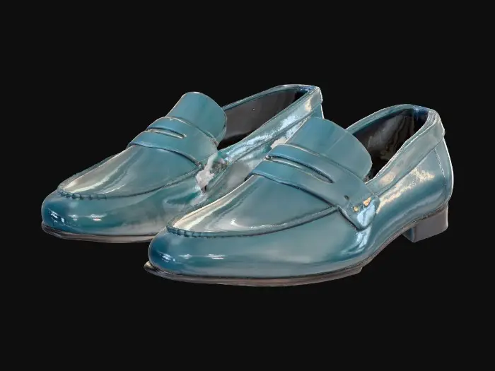 3D model for Luxury fashion loafers, elegant avant-garde design.
Flat leather sole, refined low-profile silhouette.
Upper crafted from premium smooth calfskin leather in solid #2F70AF color (deep blue-teal).
Subtle tonal stitching, minimal seams for a clean couture look.
Embossed monogram logo on the side panel, discreet metallic accent on the heel.
Classic penny-loafer strap detail across the vamp, with a modern sculpted twist.
Ultra-detailed PBR textures: polished leather sheen, fine stitching, subtle wear.
Studio lighting, neutral background, clean UVs, photorealistic high-fashion aesthetic.
